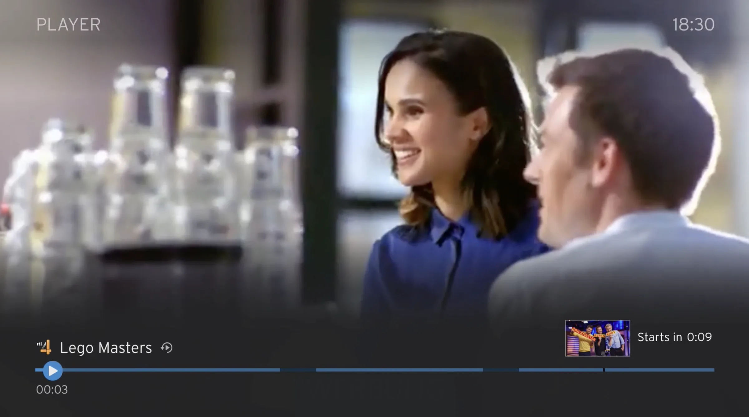 Spelerscherm van live-tv met een aankondiging dat het volgende programma over 0:09 begint